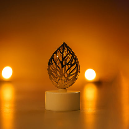 Set of 12 golden leaf-shaped flameless LED candles for home decor by Wukusy, featuring intricate leaf designs and warm LED lighting.