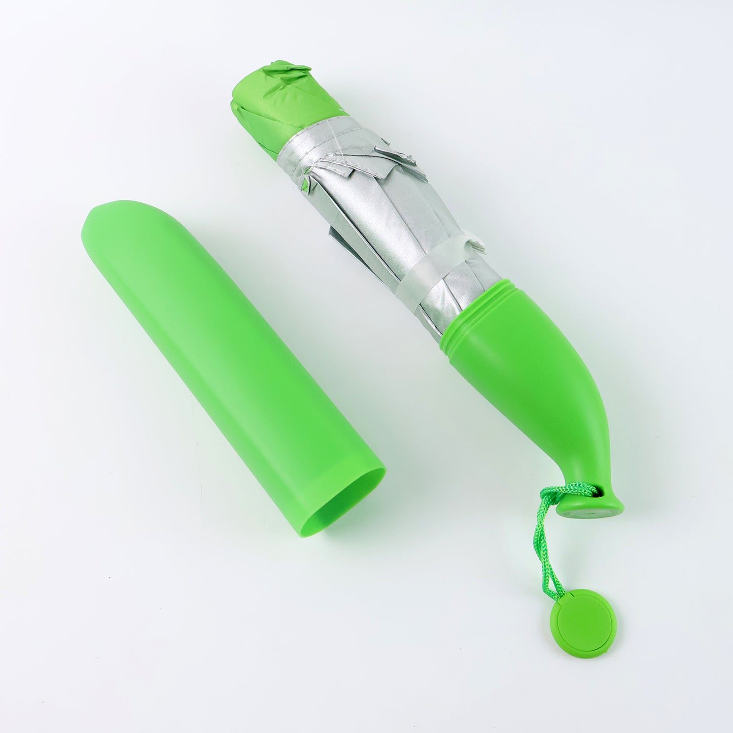 Green Wukusy travel banana-shaped mini foldable umbrella open, showing compact, stylish design ideal for on-the-go rain protection.