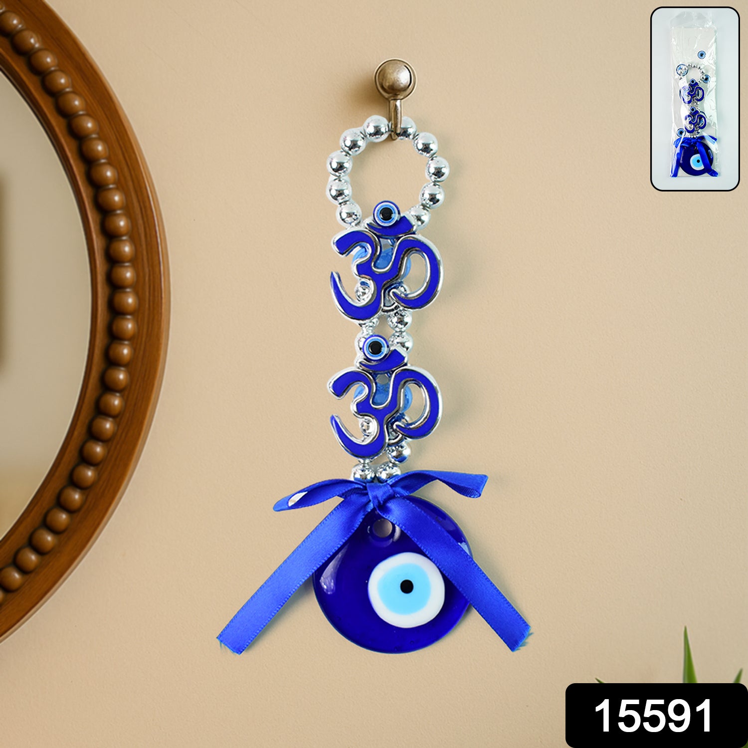 Decorative double Om symbol evil eye hanging with intricate design, made by Wukusy, featuring traditional blue and white colors for protection.