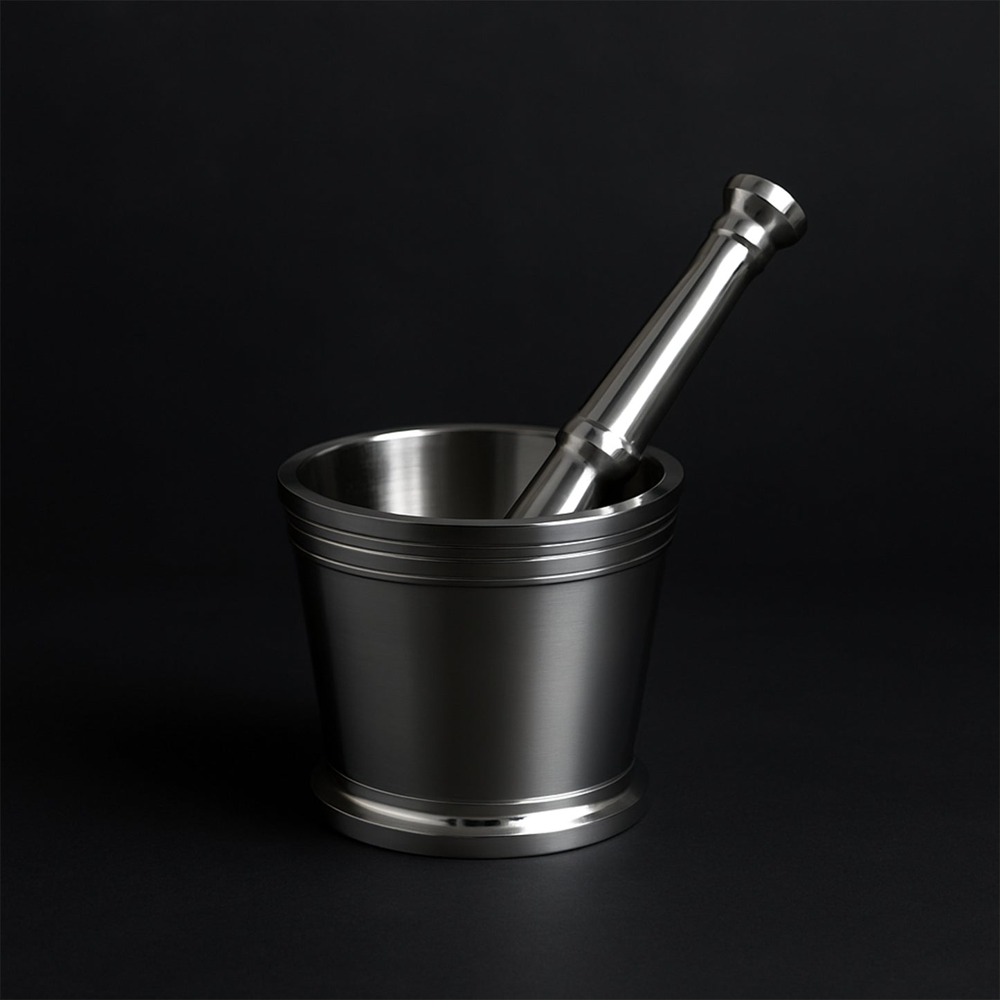Heavy duty stainless steel mortar and pestle set for kitchen by Wukusy, showing a sturdy 2-piece Khalbatta set on a countertop.