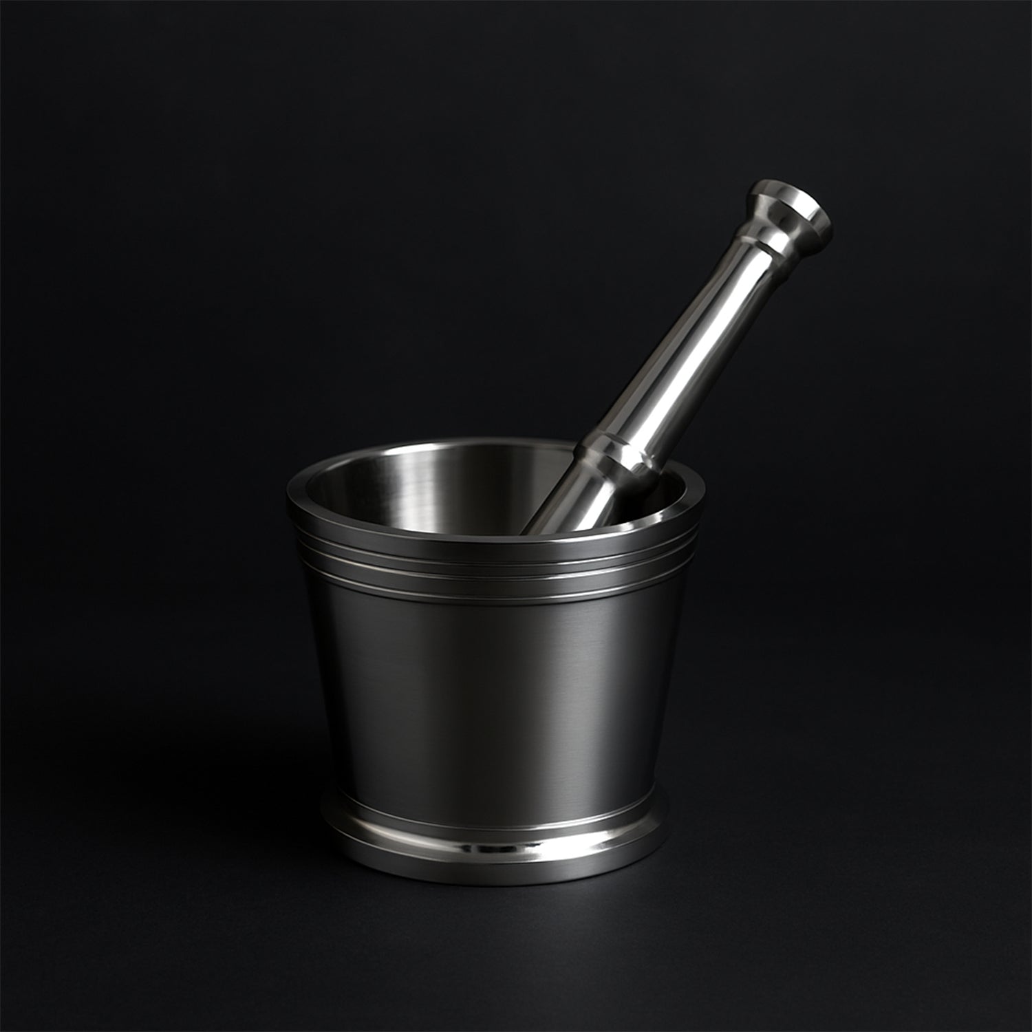 Heavy duty stainless steel mortar and pestle set for kitchen by Wukusy, showing a sturdy 2-piece Khalbatta set on a countertop.