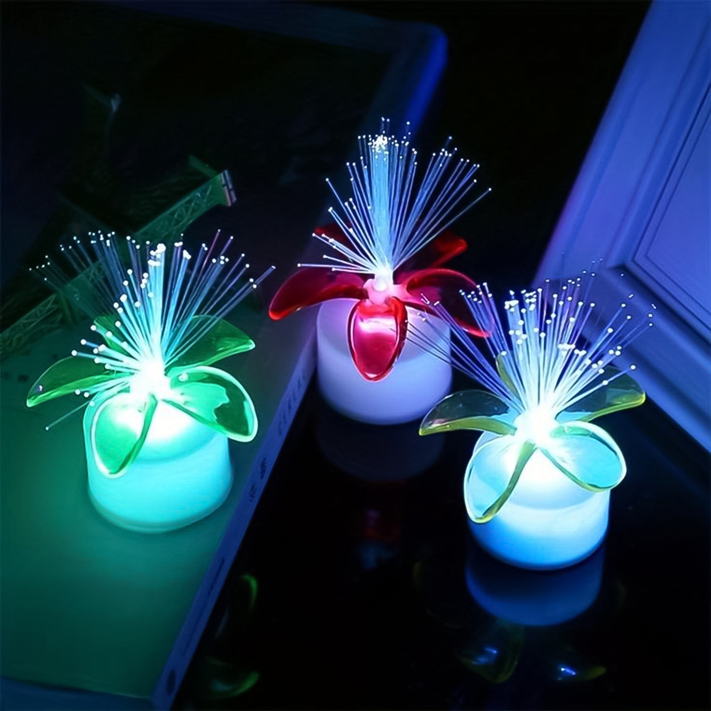 Set of 12 Wukusy fiber optic mini LED color-changing table centerpiece lights with light-up candles for home decor.