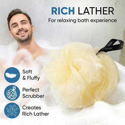 Wukusy soft mesh bath loofah scrubber hanging, showing textured surface for gentle exfoliation during shower or bath.