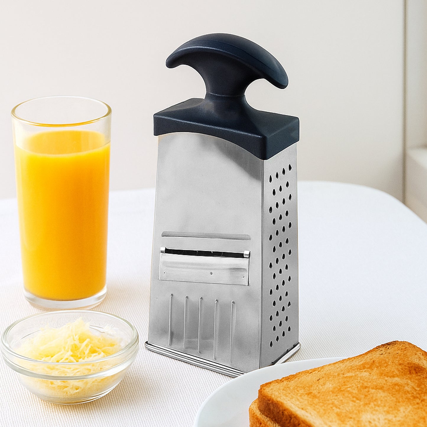 Wukusy Apex Classic 4-in-1 stainless steel grater and slicer with handle for versatile kitchen food prep.
