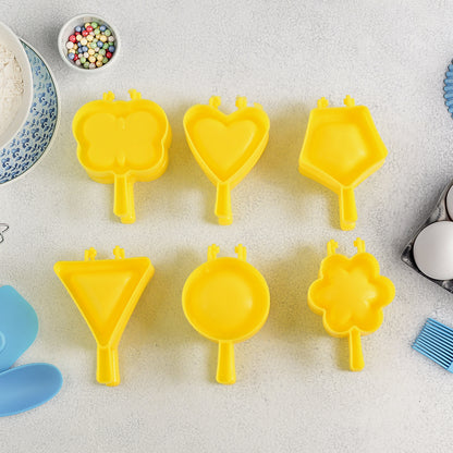 Six-piece Wukusy plastic cookie cutter set with various shapes, ideal for baking and decorating cookies in home and kitchen use.