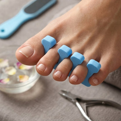 Wukusy 11-in-1 manicure and pedicure grooming kit with various nail care tools arranged in a compact set.