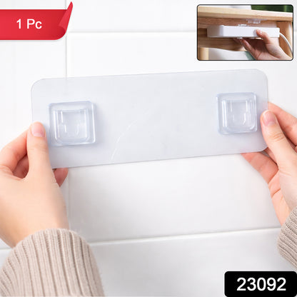 Wall-mounted Wukusy self-adhesive hanger for versatile use, shown attached to a wall with hooks for hanging items.