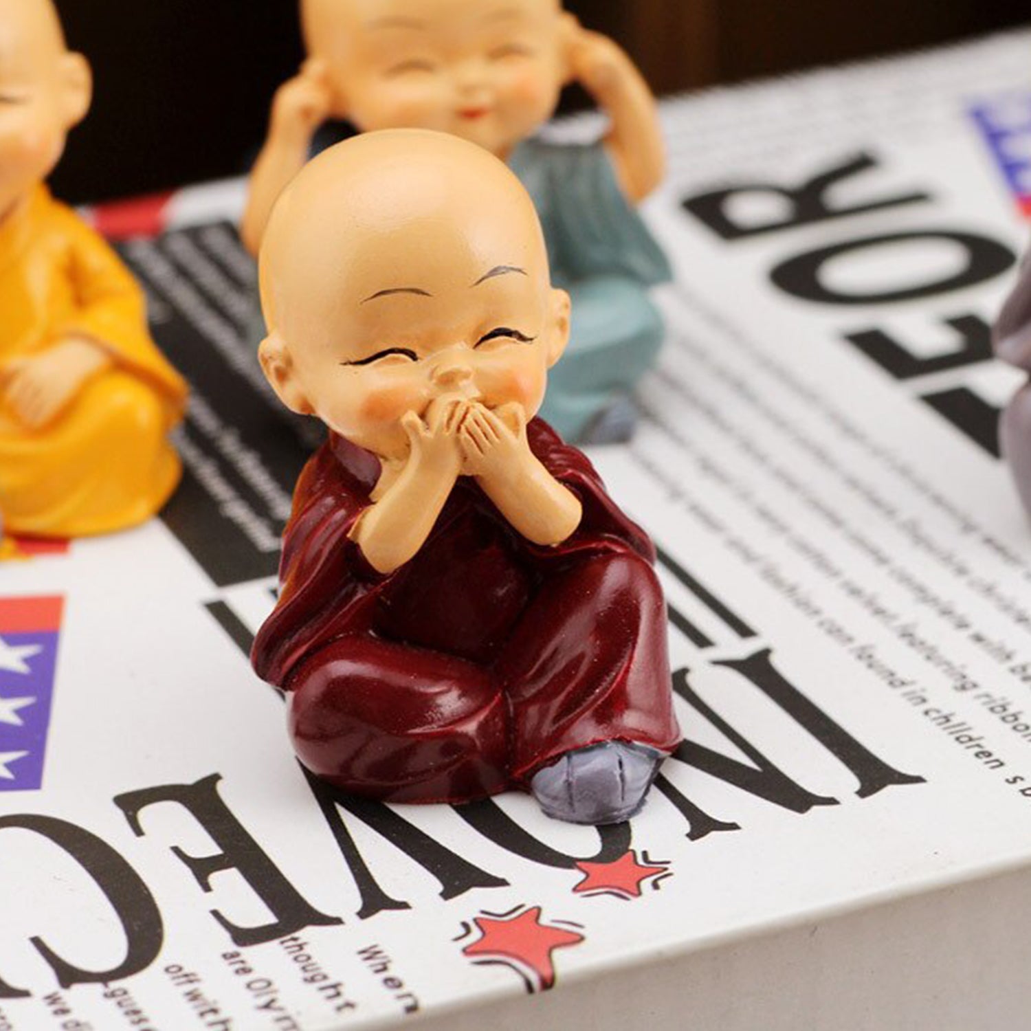 Wukusy Baby Buddha 4-piece toy set with show piece for house, office, and official decorations, featuring detailed miniature Buddha figures.
