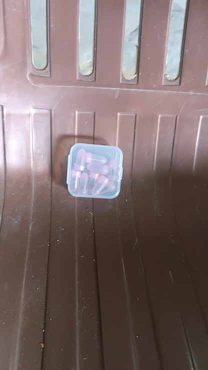 Set of 10 pink Wukusy tire repair rubber nails for car puncture repair, shown in a close-up image.