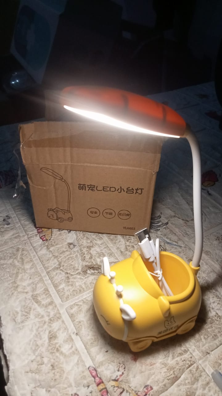 Wukusy 12591 LED reading desk lamp with 360° adjustment, foldable design, USB charging, suitable for home or office use.