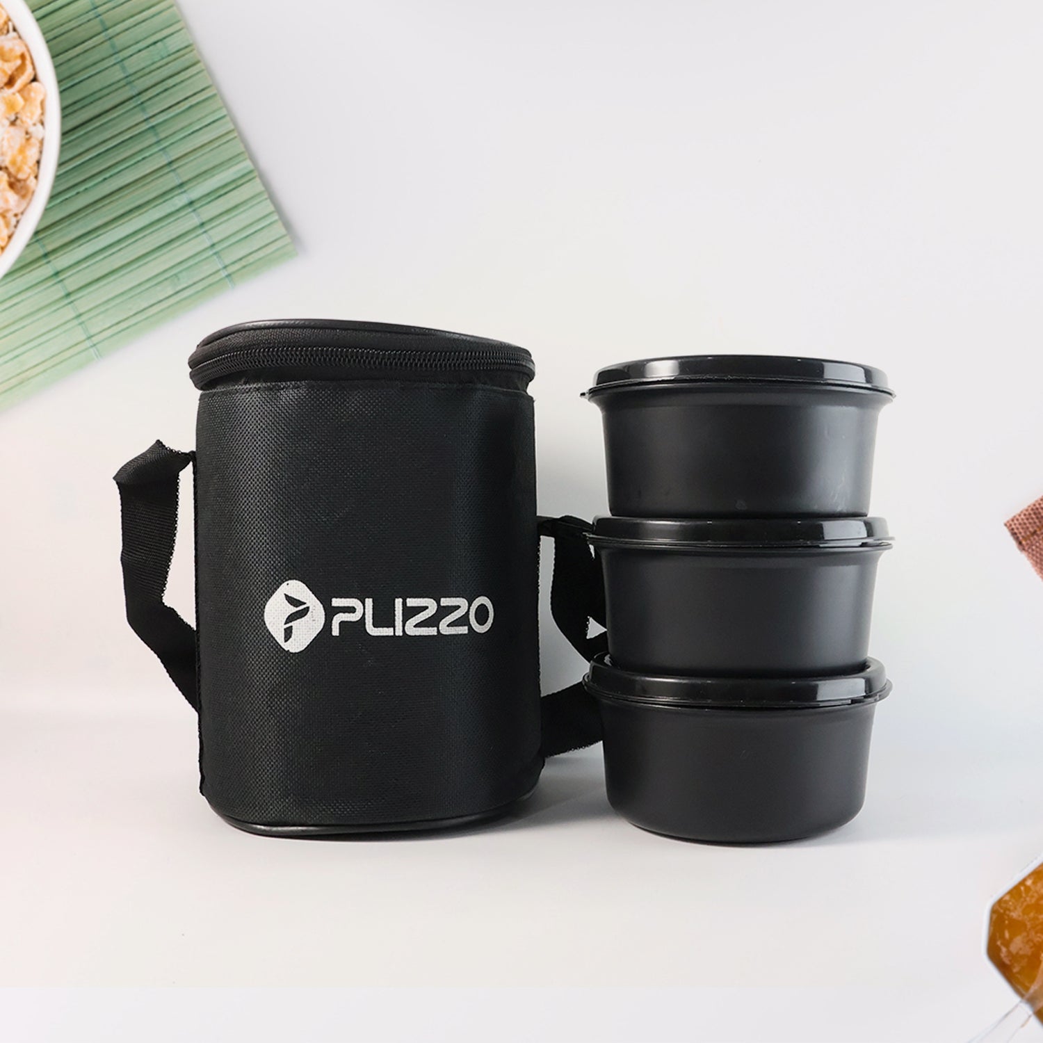 Wukusy insulated stainless steel tiffin lunch box set with carry bag, featuring multiple compartments for food storage.