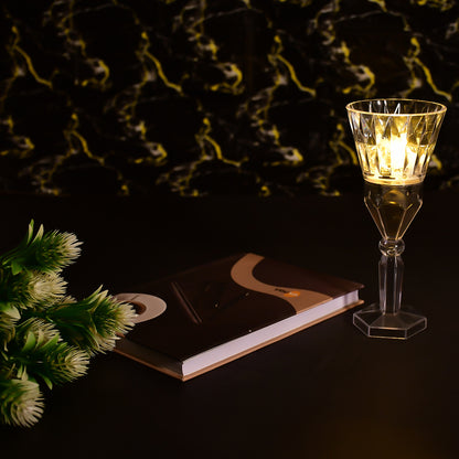 Wukusy 6610 2-in-1 transparent mini crystal table lamp with reflection light, showcasing its sleek design and reflective surface.