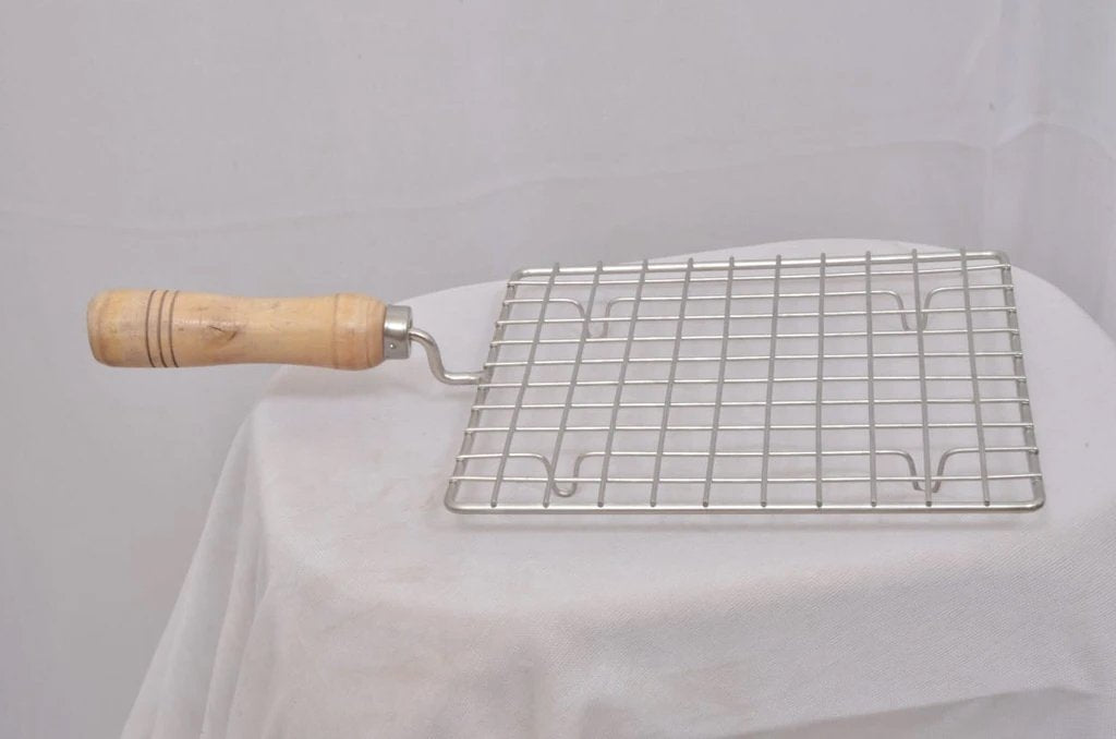 Wukusy stainless steel kitchen square roaster with wooden handle, ideal for grilling papad and barbecuing in the kitchen.
