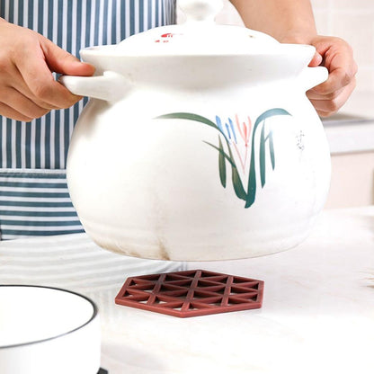 Wukusy 4042 PVC cup mat and tea coaster with non-slip, high-temperature insulation, hollow design, and anti-hot features for home use.