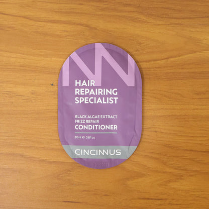 Wukusy Hair Repairing Conditioner sachet, 20ml, with nourishing formula for damaged hair, close-up of the small conditioner packet.
