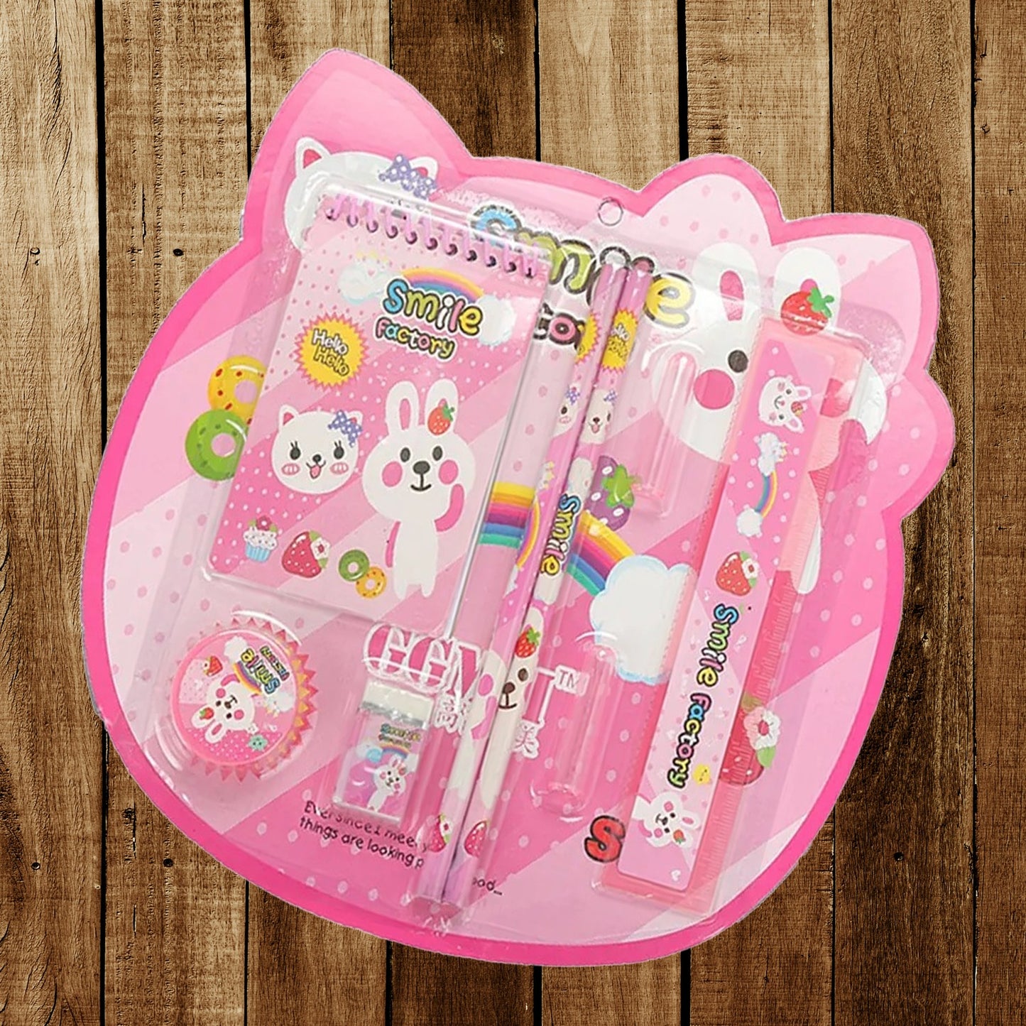 Wukusy 8-in-1 kids stationery gift set with pencils, ruler, rubber, sharpener, and pencil cover on a white background.