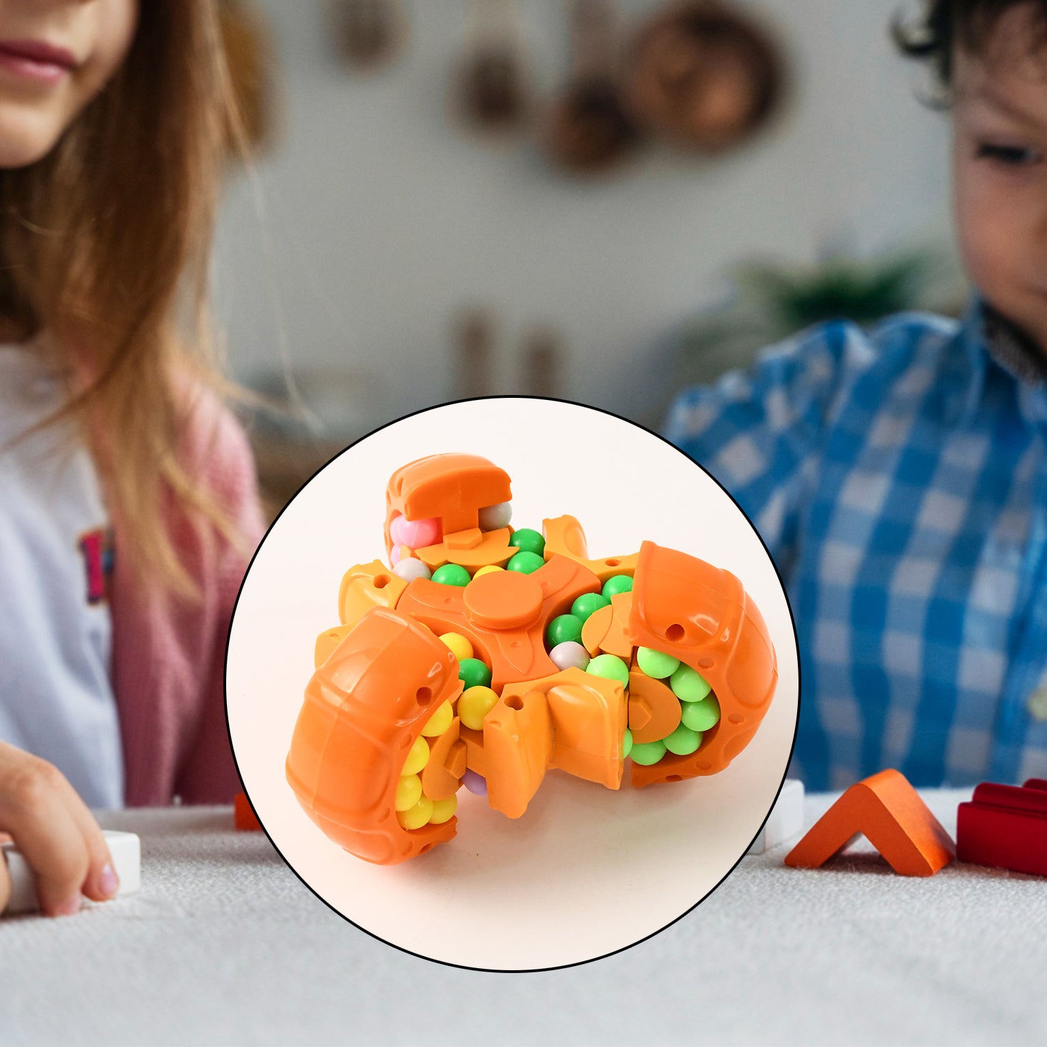 Wukusy Aditi 3-in-1 interactive spinny twist puzzle ball toy with colorful segments and textured surface for children’s play.