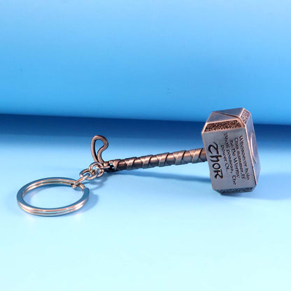 Wukusy metal hammer-shaped keychain with a detailed hammer design, perfect for key organization and accessories.