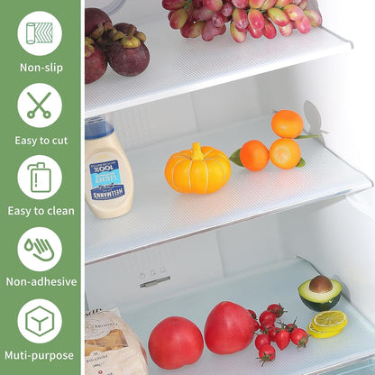 Clear plastic fridge mat from Wukusy, 45x29 cm, showing its transparent, flexible design ideal for protecting fridge shelves.
