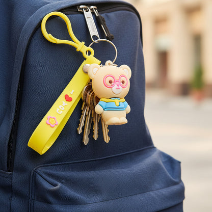 Cute cartoon bear silicone keychain by Wukusy, featuring a colorful bear design on a keyring.