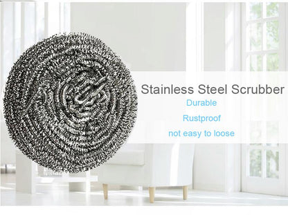 Six Wukusy stainless steel round scrubbers for kitchen cleaning, durable and effective for scrubbing pots and pans.