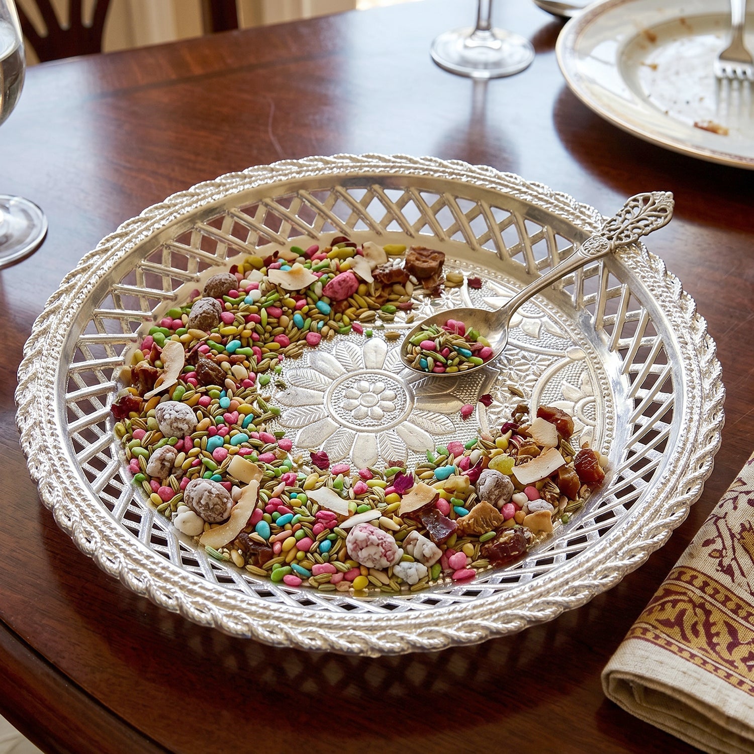 Elegant round silver serving tray with floral design by Wukusy, featuring intricate decorative patterns and a polished finish.