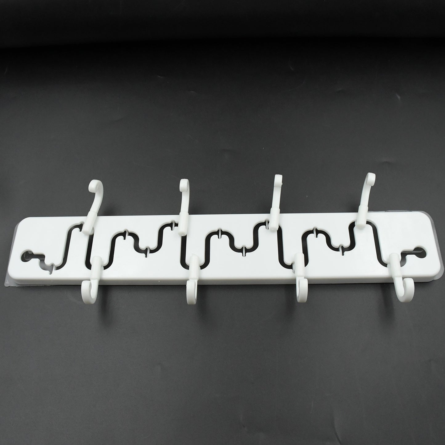 Wukusy 9431 Slideway adjustable plastic wall hook for home and bathroom use, adhesive hook with high-quality, versatile design.