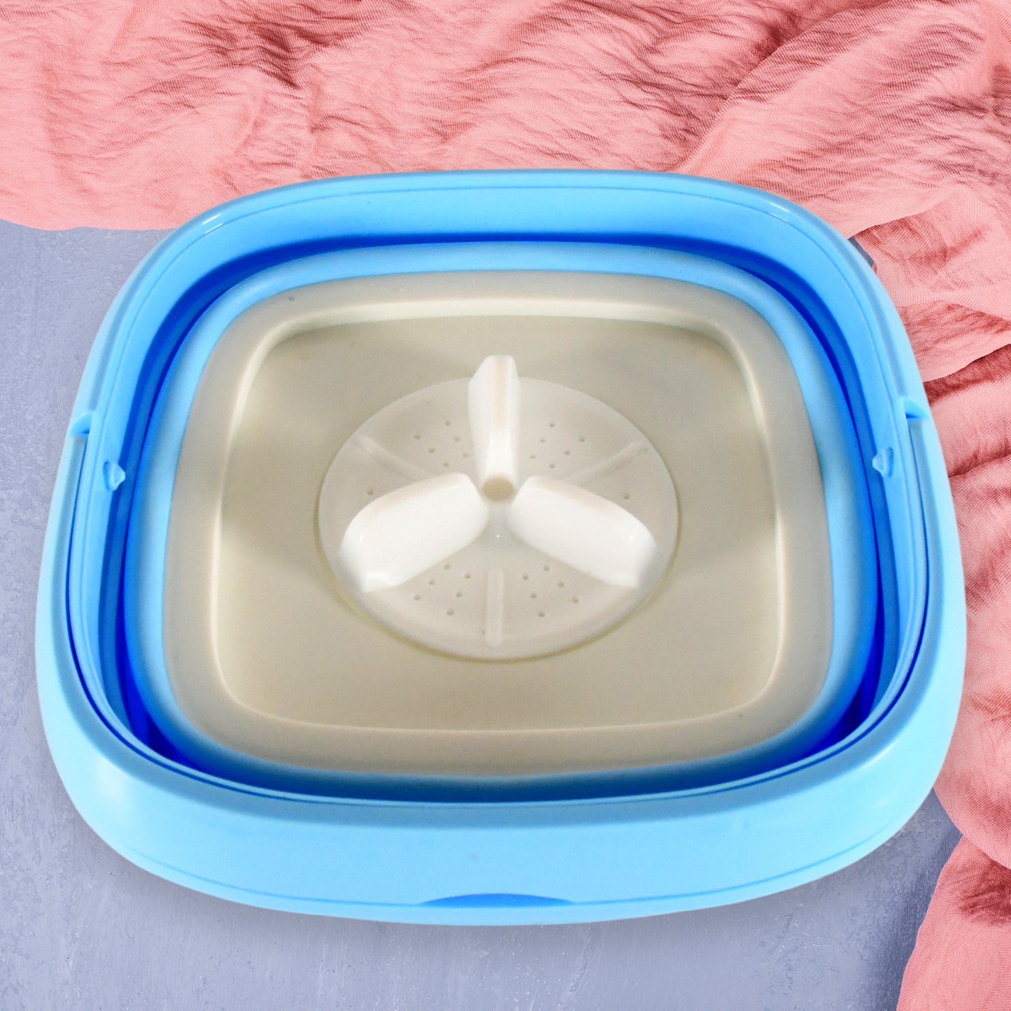 Wukusy portable washing machine mini folding washer and dryer for travel, camping, RV, dorm, or small laundry loads of clothes.