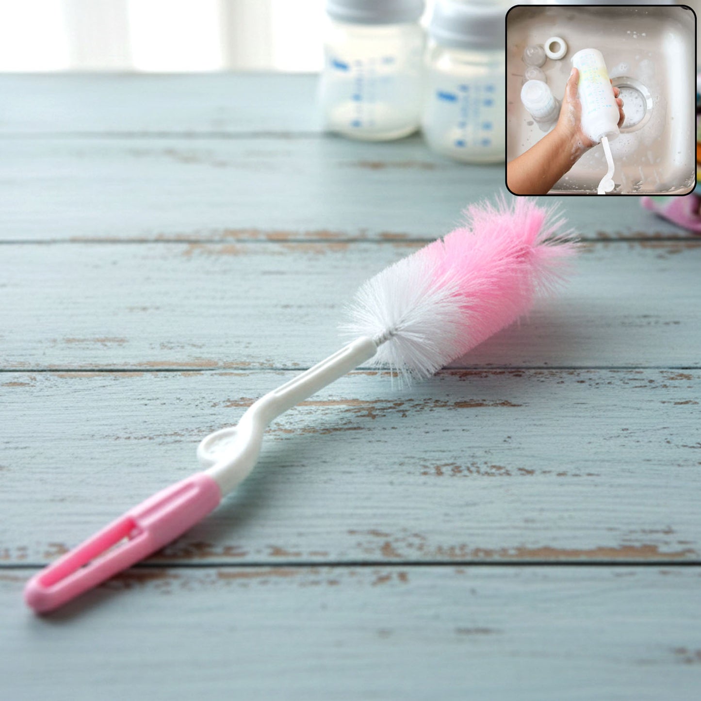 Wukusy bottle nipple cleaning brush with 360 rotary handle for thorough cleaning of baby bottles and nipples.