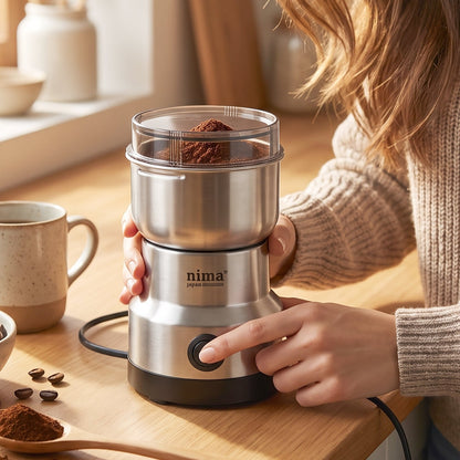 Wukusy mini electric grinder with stainless steel body, 150W for coffee, spices, and masala in a compact design.