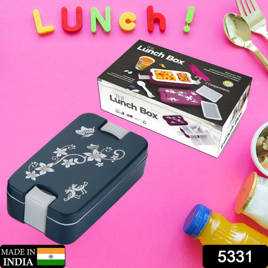 Wukusy 5331 Airtight lunch box with two compartments, leak-proof food grade material, modern design, includes a spoon.