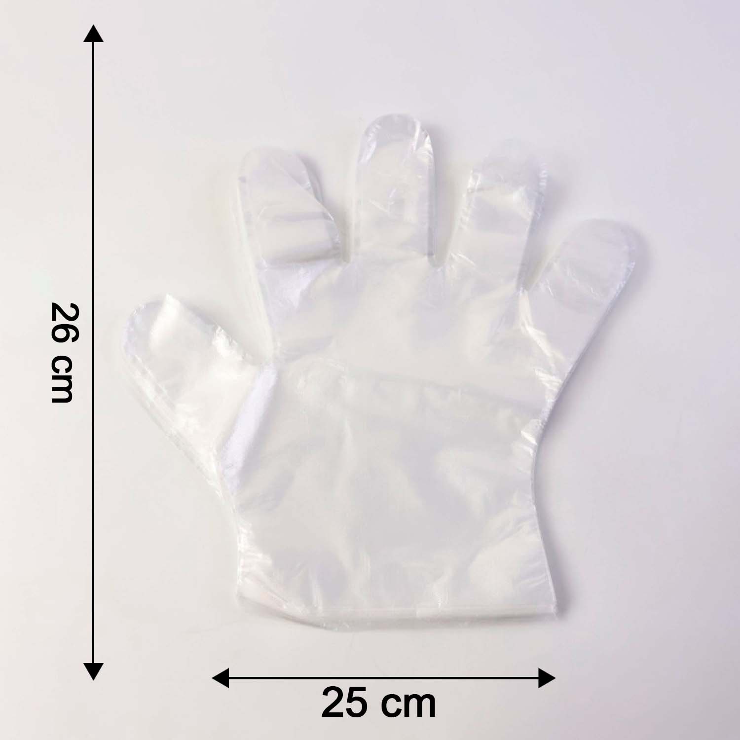 Box of 50 disposable clear gloves by Wukusy, showing all gloves neatly stacked inside a box.