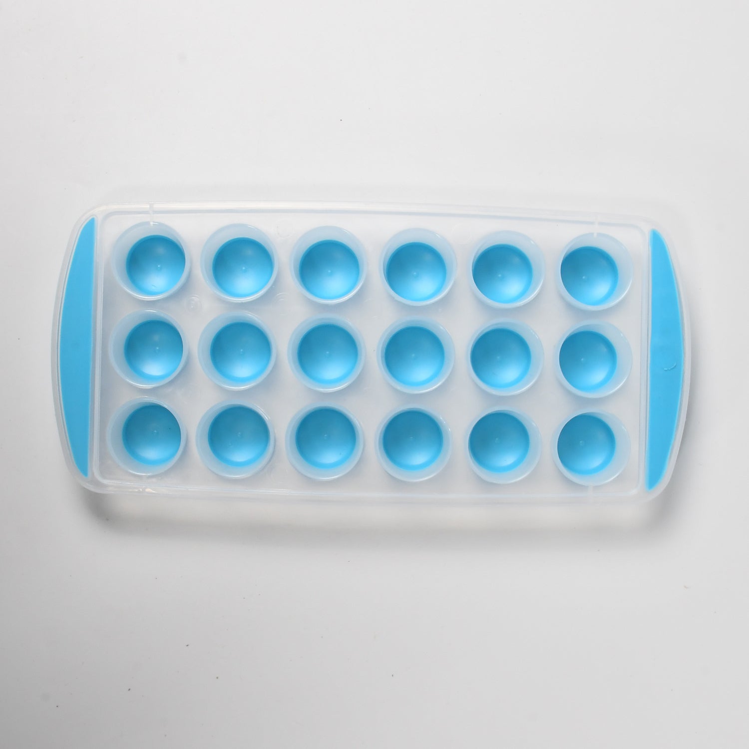 Wukusy 5353 smart push pop out round silicone ice cube tray with flexible bottom for making mini ice cubes and chocolate molds.