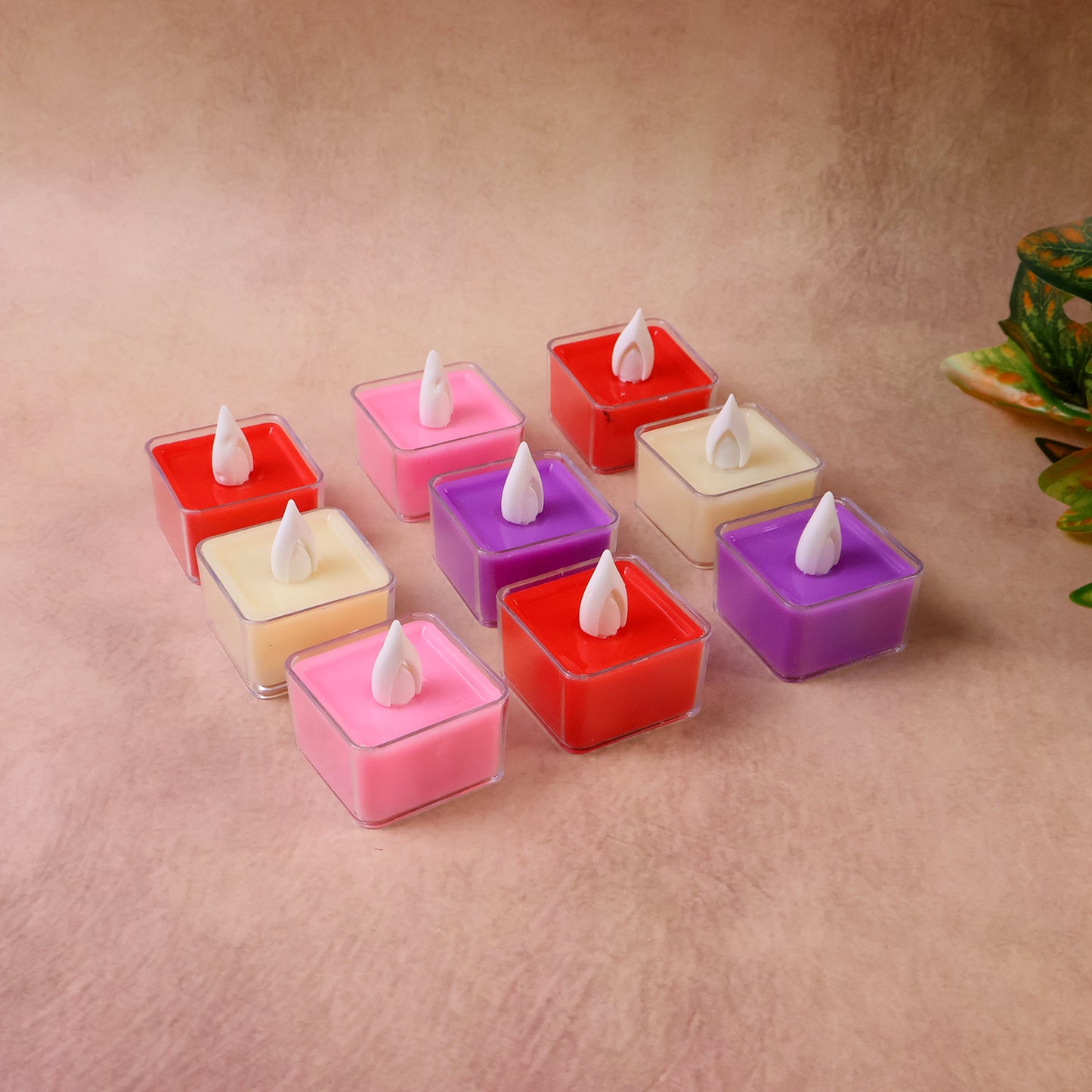 Set of nine Wukusy LED flameless decorative tealight candles for home decor, featuring a warm, flickering glow.