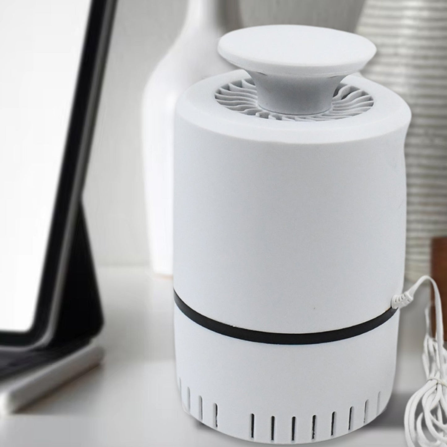 Wukusy USB-powered mosquito killer machine with purple light, designed to attract and trap mosquitoes indoors.