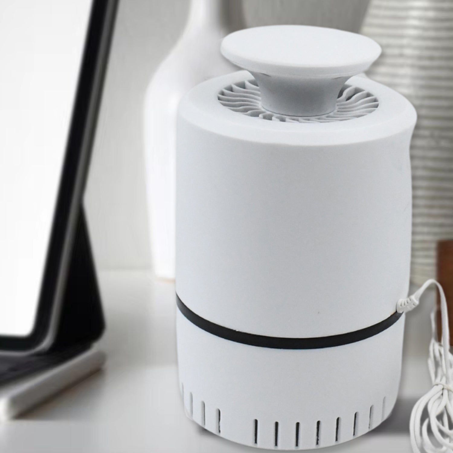 Wukusy USB-powered mosquito killer machine with purple light, designed to attract and trap mosquitoes indoors.