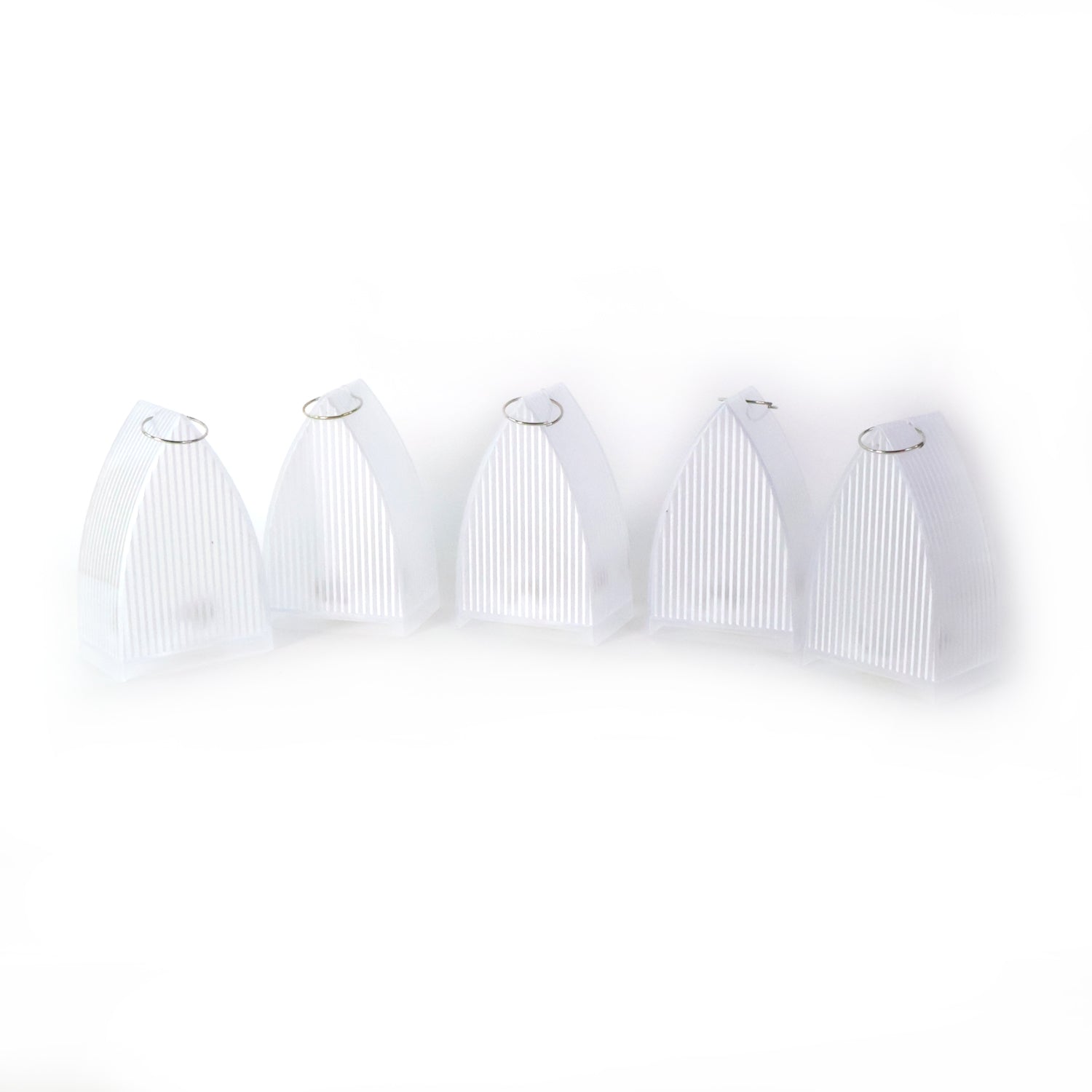 Set of five Wukusy LED flameless decorative lantern lights for home decor, displayed on a shelf with warm ambient lighting.