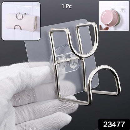Wukusy transparent double loop adhesive wall hook attached to a wall, holding a lightweight item for organizing or hanging.