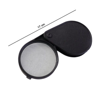 Wukusy portable handheld magnifying glass with ergonomic handle, clear lens for close-up inspection, ideal for reading and detailed work.