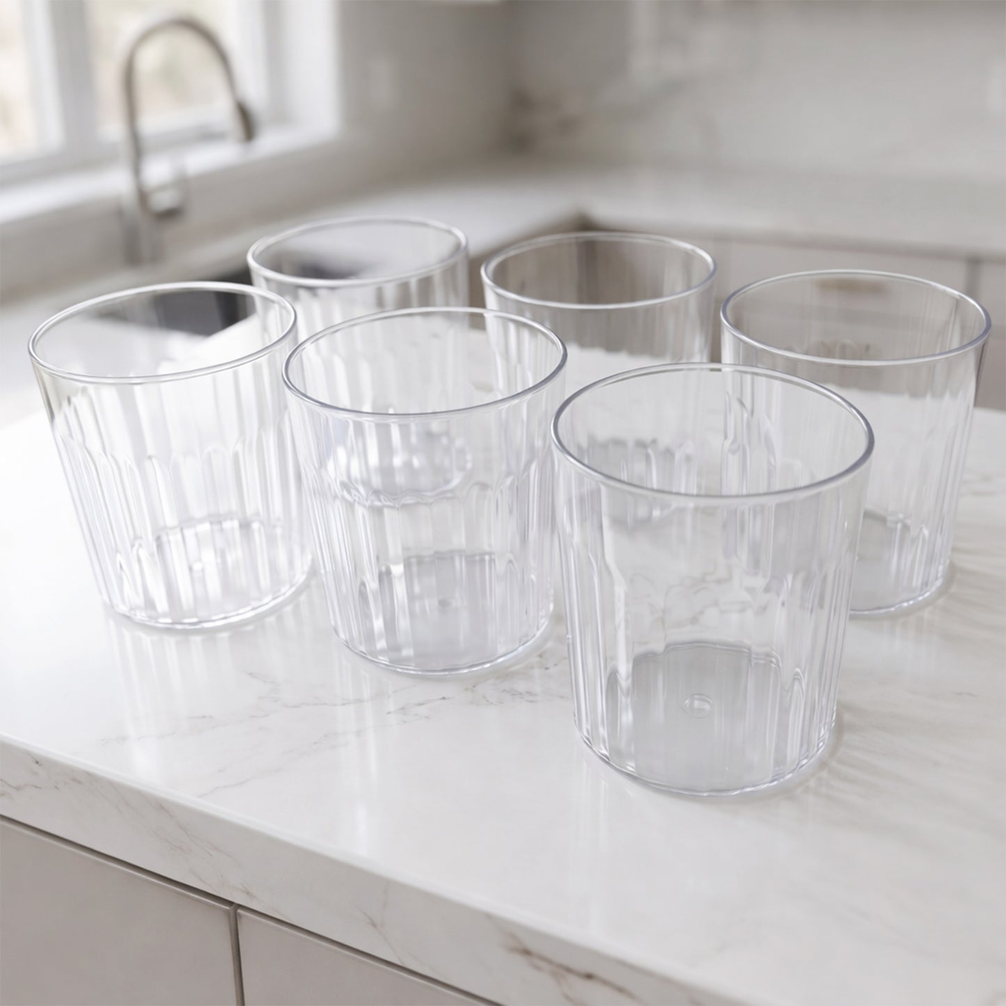 Set of six transparent drinking glasses by Wukusy, 300 ml capacity, clear glass with smooth rounded rims.