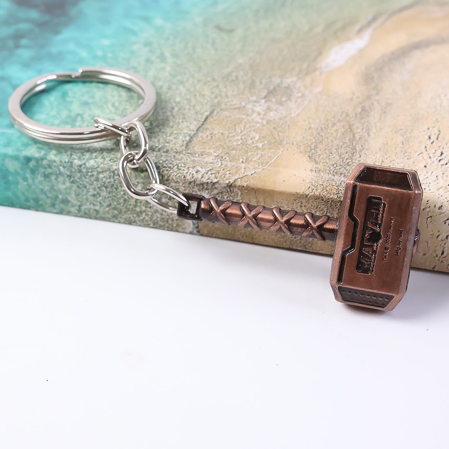 Wukusy metal hammer-shaped keychain accessory with detailed hammer design on a keyring.