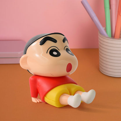 Wukusy Shinchan character sitting figurine, detailed plastic anime figure, front view showing Shinchan's playful expression.