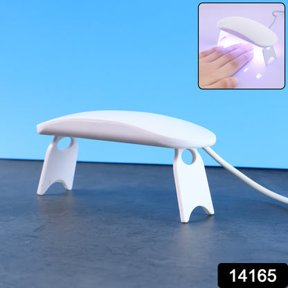 Wukusy mini portable UV LED nail lamp for gel nail polish curing, compact design with multiple LED lights for quick drying.
