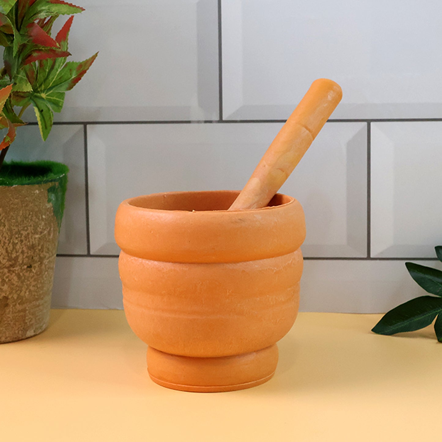 Wukusy unbreakable plastic mortar and pestle set for kitchen grinding and crushing herbs, spices, and ingredients.