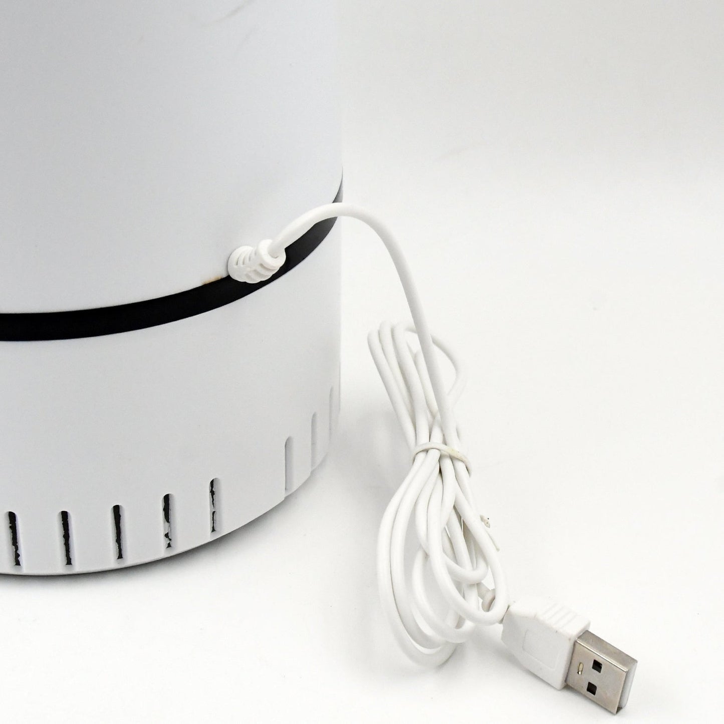 Wukusy USB-powered mosquito killer machine with sleek black design and compact size for indoor insect control.