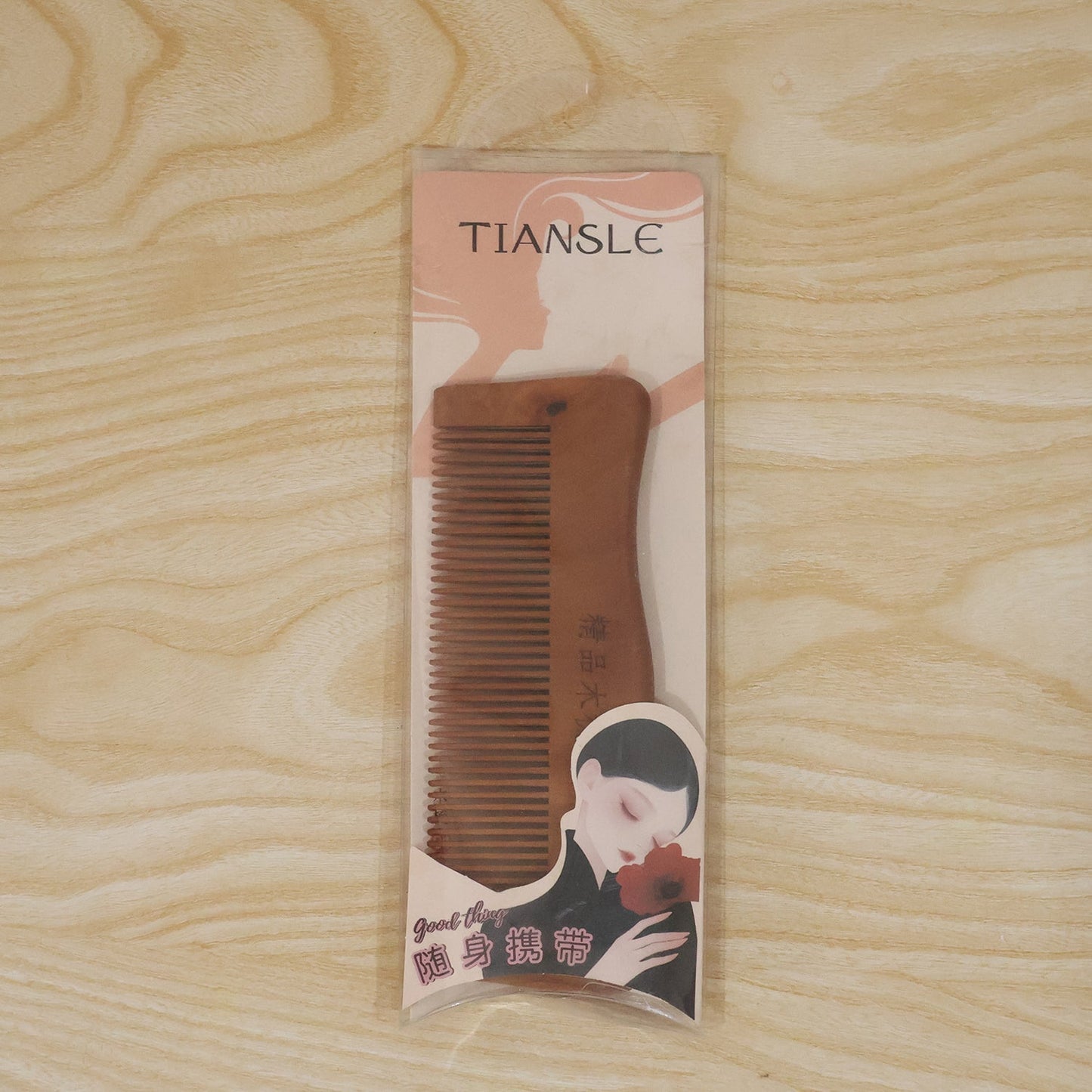 Natural wooden hair comb with fine teeth by Wukusy, anti-static hairbrush for men and women, smooth and eco-friendly design.