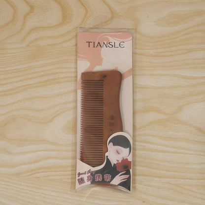 Natural wooden hair comb with fine teeth by Wukusy, anti-static hairbrush for men and women, smooth and eco-friendly design.