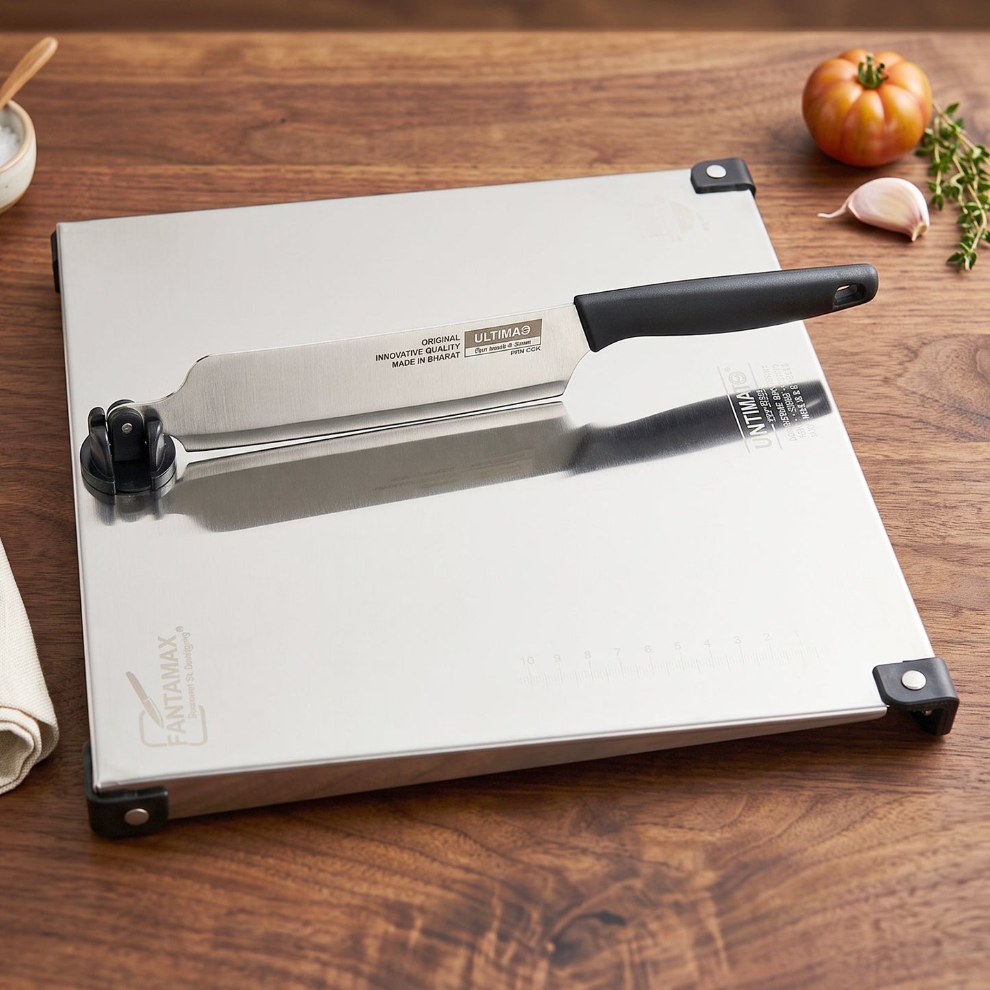 Wukusy stainless steel 2-in-1 cut and chop board with knife and sharpener, featuring a durable surface and integrated tools.