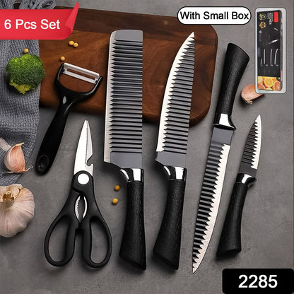 Wukusy 6-piece stainless steel knife set with chef peeler and scissors, featuring sleek blades and ergonomic handles on a kitchen countertop.