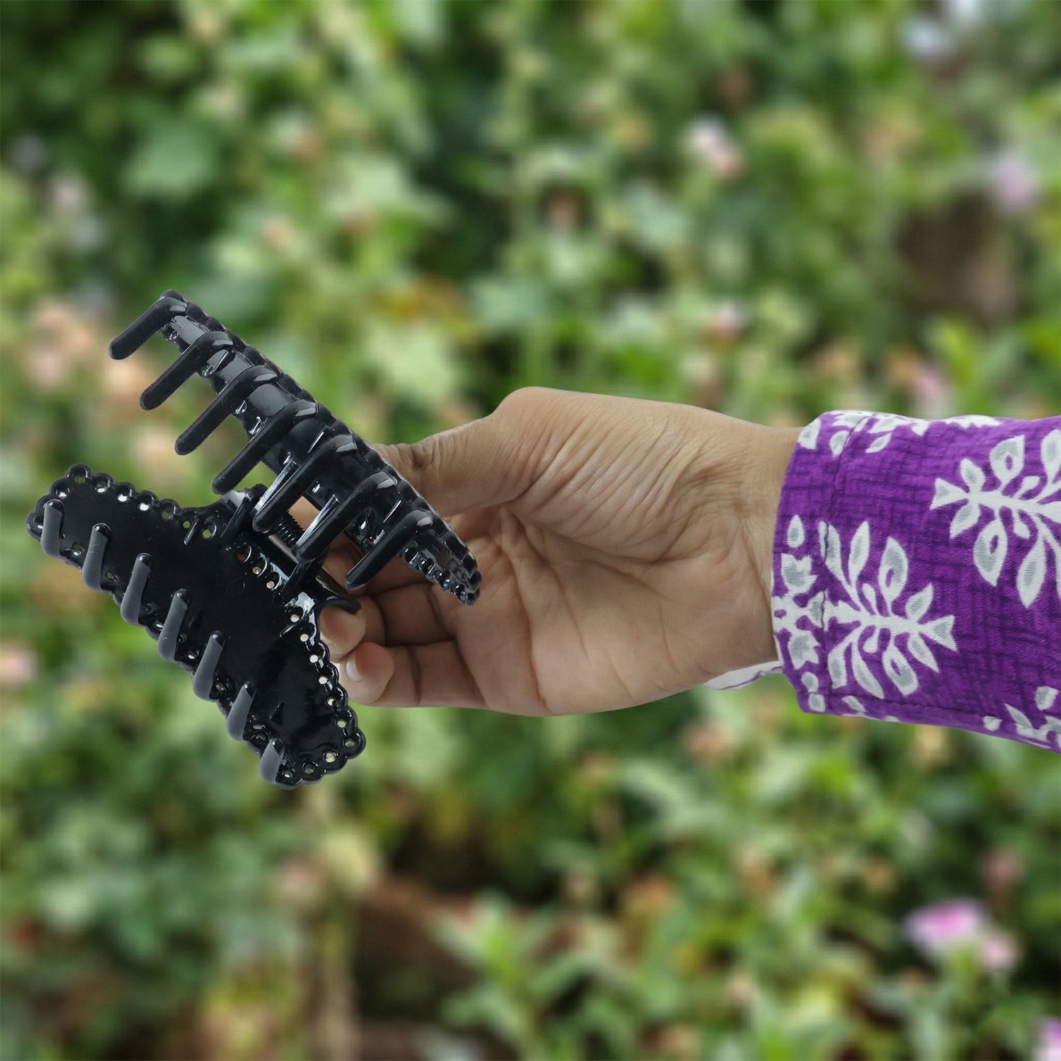 Wukusy elegant black hair claw clip holding styled hair, made of durable plastic, compact and functional accessory for daily use.